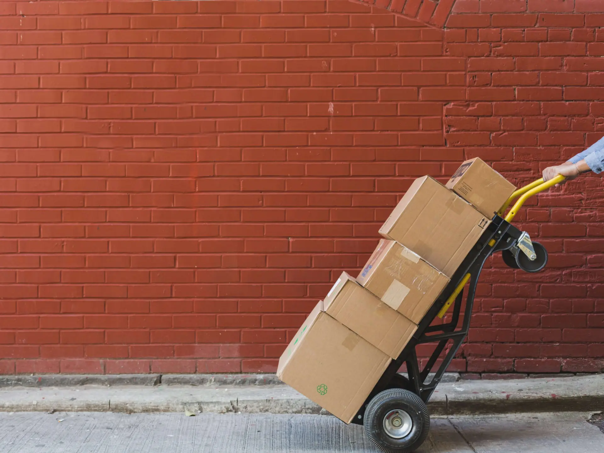 Delivery boxes stacked on a hand truck